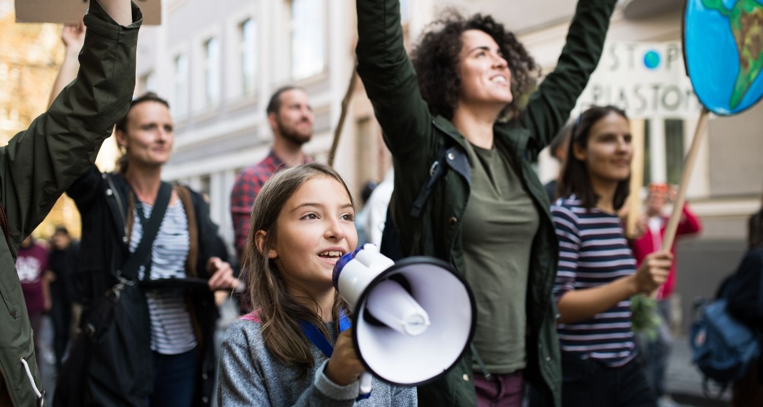 Adults and children defending the planet are marching