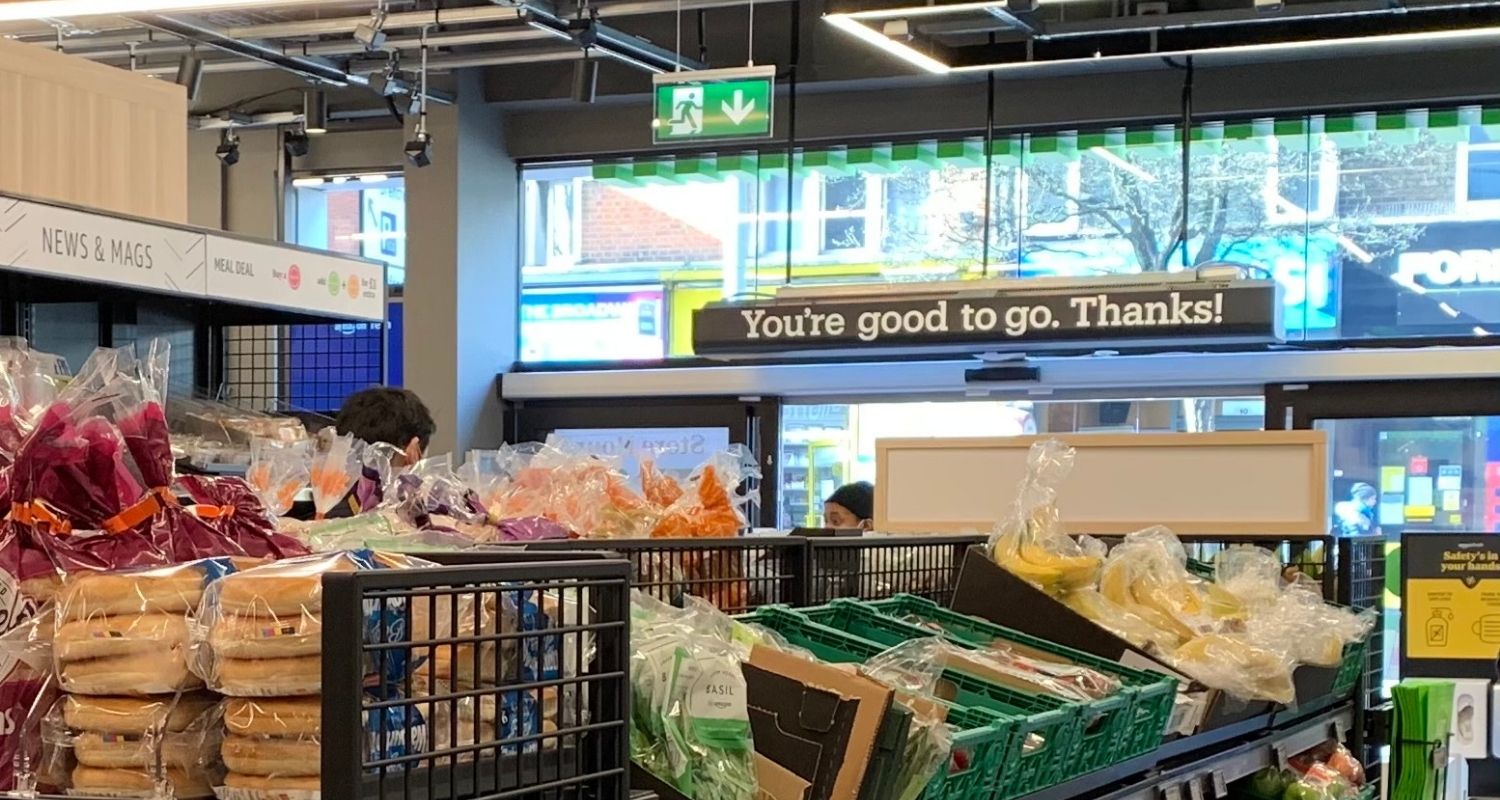 Shelves with vegetables, fruits in the supermarket