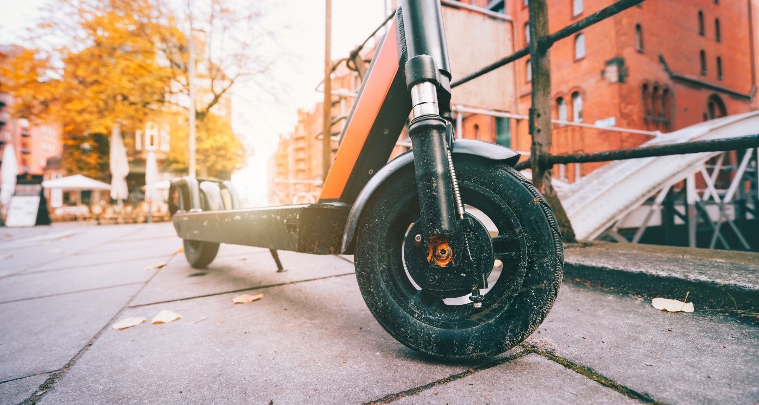 Close-up of the front wheel of an electric scooter