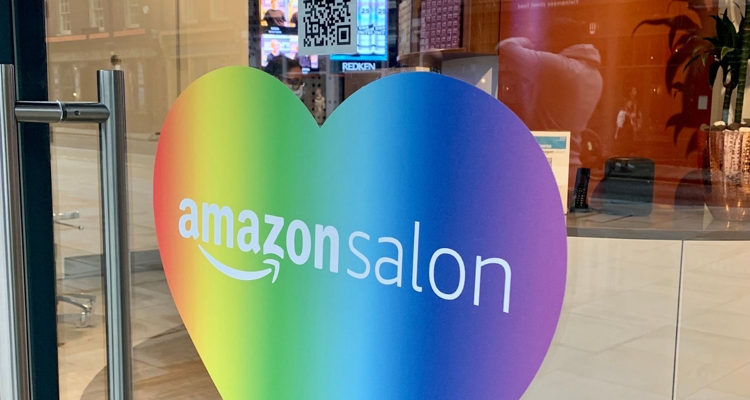 Rainbow sticker in the shape of a heart with the inscription amazonsalon