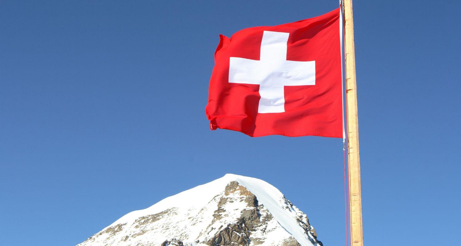 The flag of Sweden on the background of the mountain